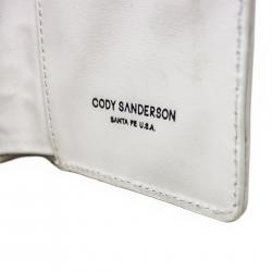 【GIFT WITH PURCHASE ONLINE】LEATHER PRINTED LOGO PASSPORT HOLDER - WHITE